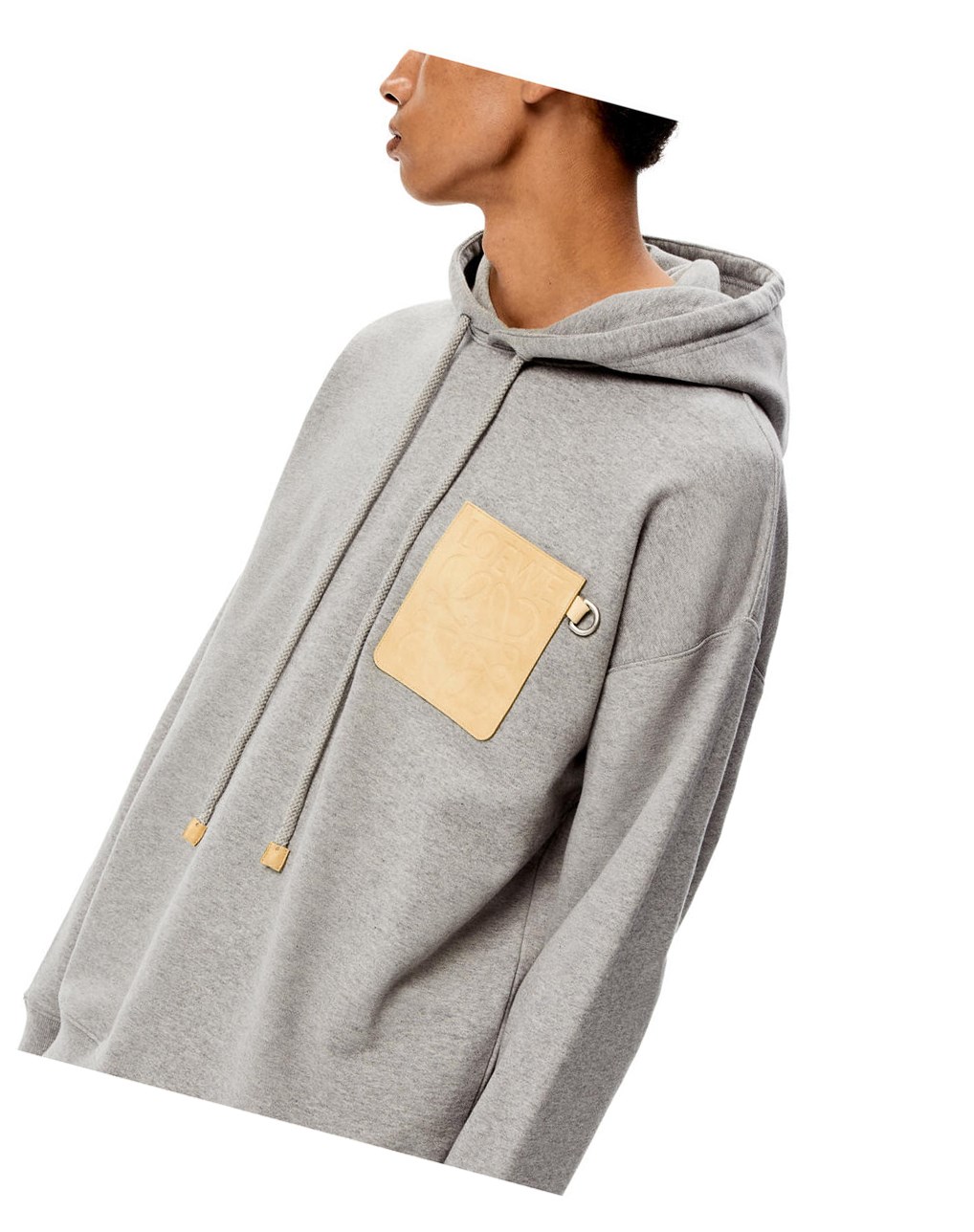 Loewe Anagram leather patch hoodie in cotton Grises | DAEKG-3450