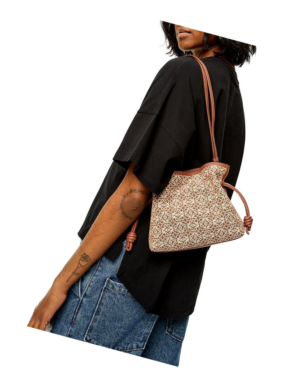 Loewe Mini Flamenco clutch in Anagram jacquard and calfskin Tan / Pecan | IFSXG-0792