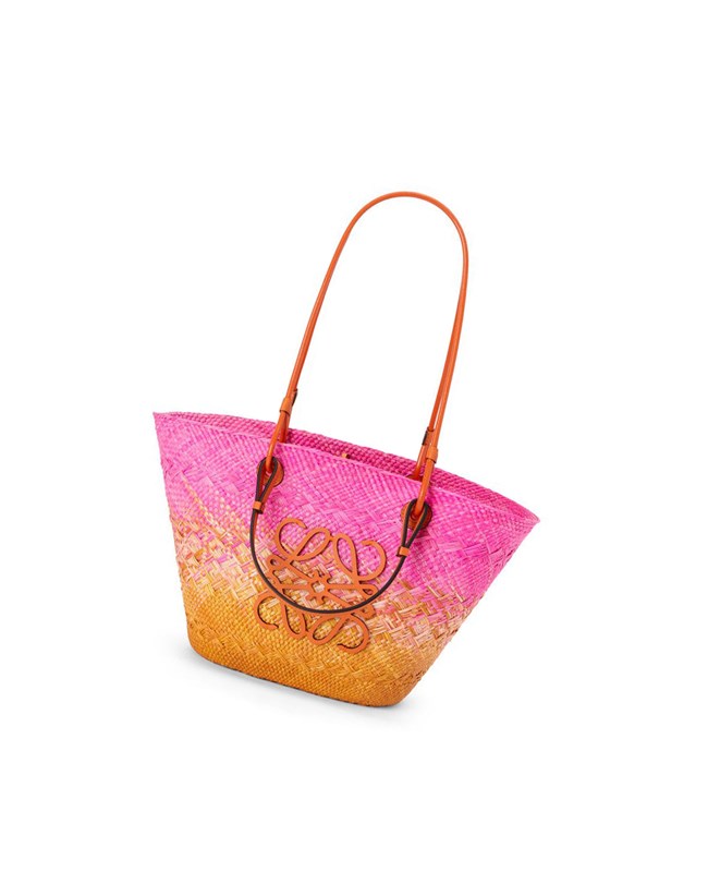 Loewe Anagram Basket bag in iraca palm and calfskin Fucsia Naranjas | KIVJC-3786