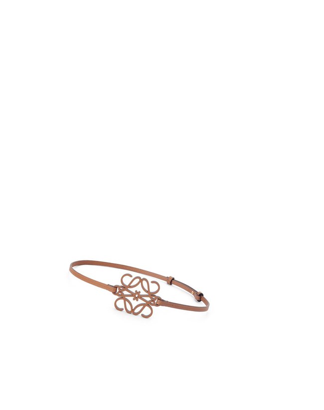 Loewe Anagram cut-out belt in soft calfskin Tan | XFEPR-1027