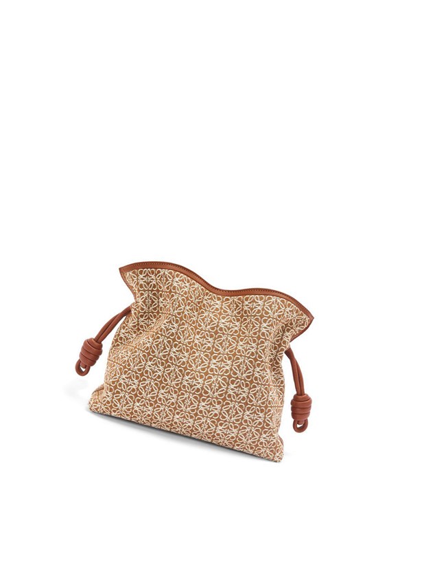 Loewe Flamenco clutch in Anagram jacquard and calfskin Tan / Pecan | ILJKC-9017