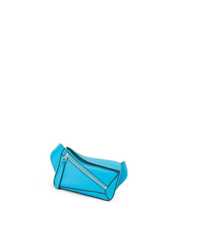 Loewe Mini Puzzle bumbag in classic calfskin Cyan | GCLFZ-5907